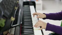 boy playing the piano Stock Footage