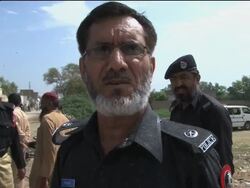 AP pix: bomb kills 11, including 3 police, scene, hospital News Clip