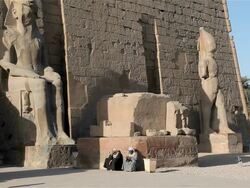 SEATED COLOSSI OF RAMSES AT LUXOR TEMPLE Stock Footage