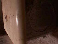 Close Up Tilt Down - Tilt down past light switch to spider /  Stock Footage