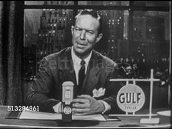 1952: SPONSOR BREAK: Bill Rogers sitting at desk on set w/ Gulf logo sign on desktop, SOT saying why don't you make that same switch over to Gulf No-Nox gasoline? 'Get more smiles per gallon in your driving.'     Early commercials. Instructional Video