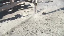 A tool uses water pressure to cut granite. Stock Footage