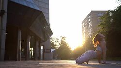 Young Woman Doing Yoga Meditation Exercises at Sunset Stock Footage