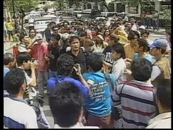 PHILIPPINES: MANILA: 11TH ANNIVERSARY OF OUSTING OF FERDINAND MARCOS News Clip