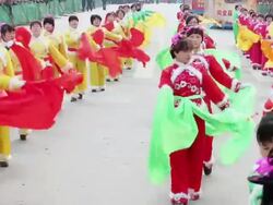 MS PAN Villagers performing yangko dance in traditional festive folk celebration or carnival during chinese spring festival  AUDIO  / xi'an, shaanxi, china Stock Footage