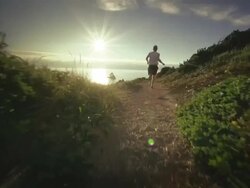 MS SLO MO POV Couple jogging on trail on Pacific Coast / Port Orford, Oregon, United States Stock Footage