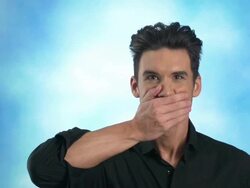 Man covers mouth Stock Footage