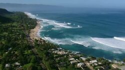 Sunset Beach, a beach on Oahu's North Shore, a famous international surfing destination during the winter months. Stock Footage
