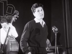 Singer and jazz band at nightclub in Juan-les-Pins, 1952 Stock Footage