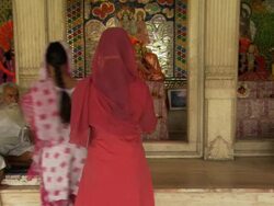 MS Two women worshiping at Golden Temple / Amritsar, Punjab, India Stock Footage