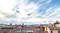Timelapse of clouds over the old roman roofs and Vatican. Rome, Italy. April, 2016. Stock Footage