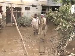 Flooding, aid, death tolls, military, aerials News Clip