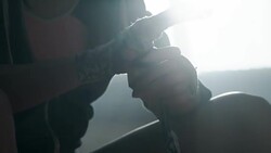 Woman is wrapping hands with boxing wraps Stock Footage