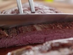 Cutting flank steak Stock Footage