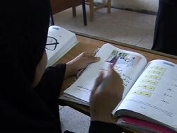 CLEAN: Iraq's illiterate hit the books News Clip