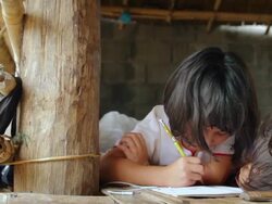 Karen girls drawing the picture on paper Stock Footage