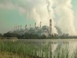 Coal fired power station with smoke stack Stock Footage