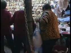 HONG KONG: FAKE GOODS FLOOD HIGH STREETS IN RECESSION LED SALES News Clip