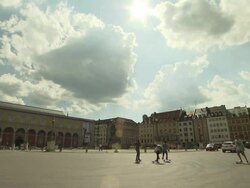 Max-Joseph-Platz, opera house, young boys on skateboard, blie sky, cars Stock Footage
