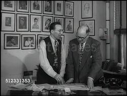 1948: NEW YORK CITY: 20TH CENTURY SPORTING CLUB OFFICE: WS Harry Markson standing w/ Sol Strauss behind desk in office, Harry talking (No SOT) gesturing to paperwork on desk w/ pen or pencil. Instructional Video
