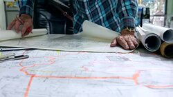 Architects working with blueprints in the office Stock Footage