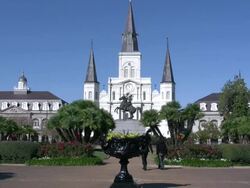 Tourists at Jackson Square Park gate entrance in New Orleans Stock Footage