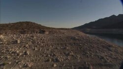 A river flows toward the Hoover Dam. Stock Footage