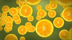Orange slices float on a green background. Stock Footage