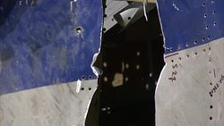 Reconstruction Of MH17 wreckage News Clip