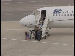 Freed embassy staff return to the UK News Clip