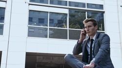 SLO MO Yuppie talking on the phone outdoor Stock Footage