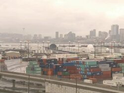 Wide Shot zoom-out - Fog settles over a harbor in Seattle, Washington / Seattle, Washington Stock Footage