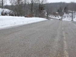 MS Husband and wife ridding on motorcycle with sidecar in rural area during winter / Osceola, Wisconsin, United States Stock Footage