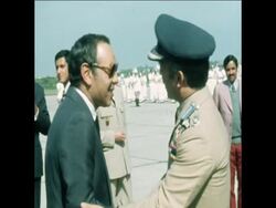SYND 15-5-74 HUSSEIN ARRIVES MET BY HASSAN Instructional Video