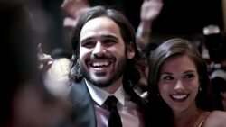 Charming couple smile and pose for photos on crowded red carpet at awards show Stock Footage