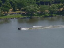 WS AERIAL TS Waterskier in Potomac River to Thomas Jefferson Memorial / Washington, Dist. of Columbia, United States Stock Footage