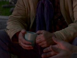 Cowboys sit around fire Stock Footage