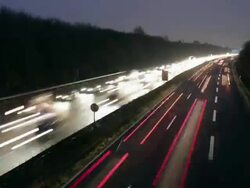 WS T/L View of motorway with heavy traffic at dusk /Cologne, North Rhine-Westphalia, Germany  Stock Footage