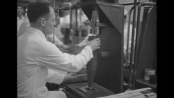US factory workers make artillery shells during Korean War News Clip
