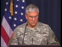 WRAP  Khalilzad and General Casey presser, supply convoy crosses border into Iraq News Clip