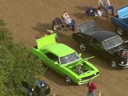MS AERIAL ZI Shot of US Classic Car Exhibition with people / South Carolina, United States Stock Footage