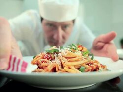 Chef preparing spaghetti dish Stock Footage
