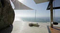 Luxury patio overlooking ocean Stock Footage