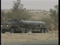 GWT: US &amp; UK military convoy near border with Iraq News Clip