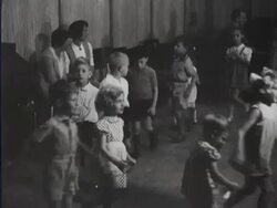 A group of children visits the NRU-studio, where they play games and sing songs Stock Footage