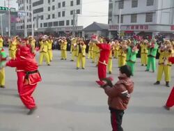 MS TS Villagers performing gongs and drums in traditional festive folk celebration or carnival during chinese spring festival  AUDIO  / xi'an, shaanxi, china Stock Footage