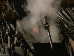 CU Bladesmith making sword / Wiltshire / UK Stock Footage