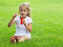 Little girl having fun in park Stock Footage