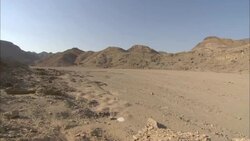 Hills surround a wadi in the ancient emerald mining town of Sikait, Egypt. Stock Footage