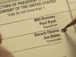 XCU of voter using pencil to mark presidential ballot for Barack Obama Stock Footage